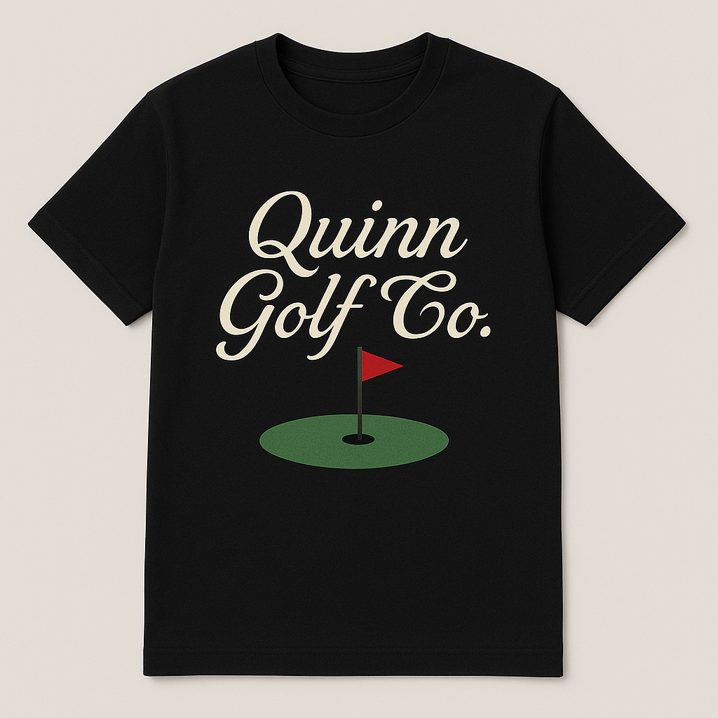 Black t-shirt with 'Quinn Golf Co.' text and golf flag design on a beige background